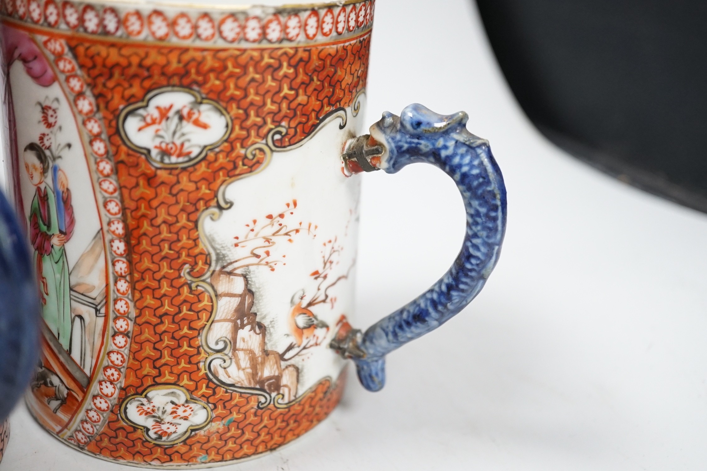 Two Chinese export 'mandarin' mugs and a similar teapot, Qianlong period, tallest mug 14cms high
